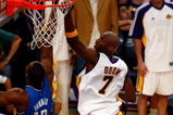 LOS ANGELES, CA - JUNE 07:  Lamar Odom #9 of the Los Angeles Lakers goes to the basket over Dwight Howard #12 of the Orlando Magic in Game Two of the 2009 NBA Finals at Staples Center on June 7, 2009 in Los Angeles, California. NOTE TO USER: User expressly acknowledges and agrees that, by downloading and or using this photograph, User is consenting to the terms and conditions of the Getty Images License Agreement.  (Photo by Jeff Gross/Getty Images)