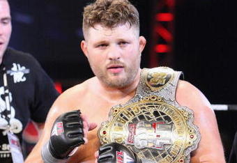 UNCASVILLE, CT - MAY 16:  Roy Nelson (White Trunks) of the Lions Den celebrates after beating Brad Imes of the MilesTech Fighting System during their bout presented by the International Fighting League at the Mohegan Sun Arena May 16, 2008 in Uncasville, Connecticut.  (Photo by Al Bello/Getty Images)