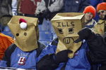 ORCHARD PARK, NY - DECEMBER 17:  Fans of the Buffalo Bills sit with paper bags over their heads during a loss to the Denver Broncos on December 17, 2005 at Ralph Wilson Stadium in Orchard Park, New York. The Broncos defeated the Bills 28-17.  (Photo by Rick Stewart/Getty Images)