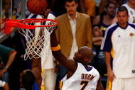 LOS ANGELES, CA - JUNE 07:  Lamar Odom #9 of the Los Angeles Lakers goes to the basket over Dwight Howard #12 of the Orlando Magic in Game Two of the 2009 NBA Finals at Staples Center on June 7, 2009 in Los Angeles, California. NOTE TO USER: User expressly acknowledges and agrees that, by downloading and or using this photograph, User is consenting to the terms and conditions of the Getty Images License Agreement.  (Photo by Jeff Gross/Getty Images)