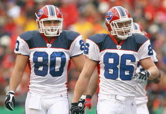 KANSAS CITY, MO - NOVEMBER 23:  Derek Schouman #80 and Derek Fine #86 of the Buffalo Bills walk on the field during the game against the Kansas City Chiefs on November 23, 2008 at Arrowhead Stadium in Kansas City, Missouri. (Photo by Jamie Squire/Getty Images)