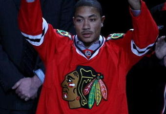 CHICAGO - MAY 07:  Derrick Rose of the Chicago Bulls acknoledges the crowd prior to dropping the puck for the ceremonial face off prior the Chicago Blackhawks hosting the Vancouver Canucks during Game Four of the Western Conference Semifinal Round of the 2009 Stanley Cup Playoffs on May 7, 2009 at the United Center in Chicago, Illinois.  (Photo by Chris Chambers/Getty Images)