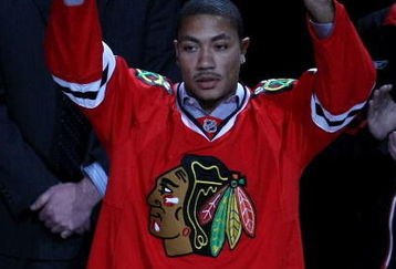 CHICAGO - MAY 07:  Derrick Rose of the Chicago Bulls acknoledges the crowd prior to dropping the puck for the ceremonial face off prior the Chicago Blackhawks hosting the Vancouver Canucks during Game Four of the Western Conference Semifinal Round of the 2009 Stanley Cup Playoffs on May 7, 2009 at the United Center in Chicago, Illinois.  (Photo by Chris Chambers/Getty Images)
