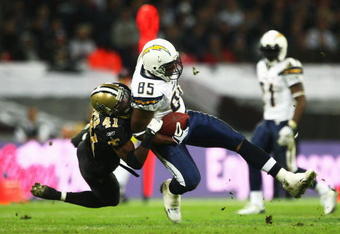 LONDON - OCTOBER 26:  Antonio Gates of the San Diego Chargers catches ahead of Roman Harper of New Orleans Saints during the Bridgestone International Series NFL match between San Diego Chargers and New Orleans Saints at Wembley Stadium on October 26, 2008 in London, England.  (Photo by Laurence Griffiths/Getty Images)