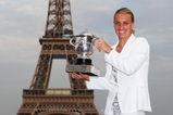 PARIS - JUNE 06:  New ladies French Open champion Svetlana Kuznetsova of Russia poses with the trophy in front of the Eiffel Tower on day fourteen of the French Open on June 6, 2009 in Paris, France.  (Photo by Ryan Pierse/Getty Images)