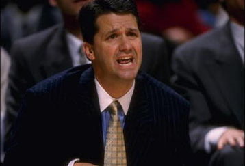 29 Nov 1995:  Coach John Calipari of the Massachusetts Minutemen watches his team with intensity from the sideline at The Palace in Auburn Hills, Michigan in the Great eight tournament. Massachusetts advanced to the Final Four by defeating Kentucky 92-82.