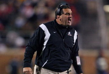 MUNCIE, IN - NOVEMBER 25:  Head coach Brady Hoke of the Ball State Cardinals stands on the field during the Mid-American Conference (MAC) game against the Western Michigan Broncos at Scheumann Stadium November 25, 2008 in Muncie, Indiana.  (Photo by Andy Lyons/Getty Images)