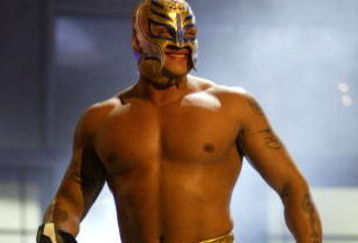 LAS VEGAS - DECEMBER 2:  (U.S. TABLOIDS OUT)   WWE wrestler Rey Mysterio walks on stage during the '1st Annual Video Game Awards' at the MGM Grand Garden Arena December 2, 2003 in Las Vegas, Nevada.  The show premieres on Spike T.V. Thursday, December 4 at 9:00PM ET/PT.  (Photo by Frank Micelotta/Getty Images)