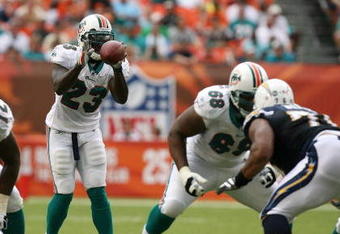 MIAMI - OCTOBER 05:  Running back Ronnie Brown #23 of the Miami Dolphins takes a direct snap while taking on the San Diego Chargers at Dolphin Stadium on October 5, 2008 in Miami, Florida. The Dolphins defeated the Chargers 17-10.  (Photo by Doug Benc/Getty Images)