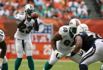 MIAMI - OCTOBER 05:  Running back Ronnie Brown #23 of the Miami Dolphins takes a direct snap while taking on the San Diego Chargers at Dolphin Stadium on October 5, 2008 in Miami, Florida. The Dolphins defeated the Chargers 17-10.  (Photo by Doug Benc/Getty Images)