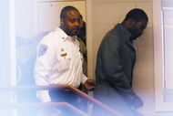 Sussex, VA - NOVEMBER 25: Suspended Atlanta Falcons quarterback Michael Vick (R) leaves Surry County Circuit Court after entering a guilty plea on two felony counts connected to dog fighting on November 25, 2008 in Sussex, Virginia. Under a plea agreement, Vick, who is currently serving a term in prison for federal dog fighting charges, will serve one-year of probation for the state charges. He is scheduled to be released on July of 2009. (Photo by Geoff Burke/Getty Images)