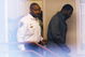 Sussex, VA - NOVEMBER 25:  Suspended Atlanta Falcons quarterback Michael Vick (R) leaves Surry County Circuit Court after entering a guilty plea on two felony counts connected to dog fighting on November 25, 2008 in Sussex, Virginia. Under a plea agreement, Vick, who is currently serving a term in prison for federal dog fighting charges, will serve one-year of probation for the state charges. He is scheduled to be released on July of 2009.  (Photo by Geoff Burke/Getty Images)