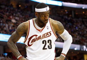 CLEVELAND - MAY 28:  LeBron James #23 of the Cleveland Cavaliers looks on during Game Five of the Eastern Conference Finals against the Orlando Magic  during the 2009 Playoffs at Quicken Loans Arena on May 28, 2009 in Cleveland, Ohio. NOTE TO USER: User expressly acknowledges and agrees that, by downloading and or using this photograph, User is consenting to the terms and conditions of the Getty Images License Agreement  (Photo by Gregory Shamus/Getty Images)