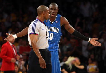 LOS ANGELES, CA - JUNE 07:  Mickael Pietrus #20 of the Orlando Magic argues a call with referee Tom Washington #49 in the first quarter of Game Two of the 2009 NBA Finals against the Los Angeles Lakers at Staples Center on June 7, 2009 in Los Angeles, California. NOTE TO USER: User expressly acknowledges and agrees that, by downloading and or using this photograph, User is consenting to the terms and conditions of the Getty Images License Agreement.  (Photo by Jed Jacobsohn/Getty Images)