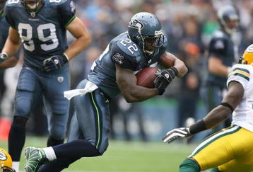SEATTLE - OCTOBER 12:  Running back Julius Jones #22 of the Seattle Seahawks runs with the ball against the Green Bay Packers during the game on October 12, 2008 at Qwest Field in Seattle, Washington. The Packers defeated the Seahawks 27-17. (Photo by Otto Greule Jr./Getty Images)