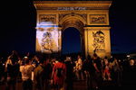 BERLIN - JULY 09:  A portrait of Zinedine Zidane  is projected on the Arc de Triomphe after the World Cup final between France and Italy July 9, 2006 in Paris, France. Italy won in a penalty shootout. (Photo by Pascal Le Segretain/Getty Images)