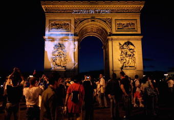 BERLIN - JULY 09:  A portrait of Zinedine Zidane  is projected on the Arc de Triomphe after the World Cup final between France and Italy July 9, 2006 in Paris, France. Italy won in a penalty shootout. (Photo by Pascal Le Segretain/Getty Images)