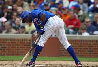 CHICAGO - MAY 27: Alfonso Soriano #12 of the Chicago Cubs draws a line in the dirt with his bat during a game against the Pittsburgh Pirates on May 27, 2009 at Wrigley Field in Chicago, Illinois. The Cubs defeated the Pirates 5-2. (Photo by Jonathan Daniel/Getty Images)