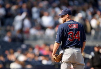 NEW YORK - APRIL 19:  Kerry Wood #34 of the Cleveland Indians pitches against the New York Yankees at Yankee Stadium on April 19, 2009 in the Bronx borough of New York City.  (Photo by Ezra Shaw/Getty Images)
