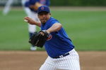 CHICAGO - MAY 27: Starting pitcher Carlos Zambrano #38 of the Chicago Cubs delivers the ball against the Pittsburgh Pirates on May 27, 2009 at Wrigley Field in Chicago, Illinois. The Cubs defeated the Pirates 5-2.  (Photo by Jonathan Daniel/Getty Images)