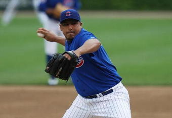 CHICAGO - MAY 27: Starting pitcher Carlos Zambrano #38 of the Chicago Cubs delivers the ball against the Pittsburgh Pirates on May 27, 2009 at Wrigley Field in Chicago, Illinois. The Cubs defeated the Pirates 5-2.  (Photo by Jonathan Daniel/Getty Images)