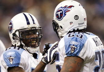 DETROIT , MI - NOVEMBER 27:  LenDale White #25 of the Tennessee Titans celebrates a second quarter touchdown with Chris Johnson #28 while playing the Detroit Lions on November 27, 2008 at Ford Field in Detroit, Michigan.  (Photo by Gregory Shamus/Getty Images)