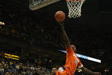 MILWAUKEE - MARCH 07: Jonny Flynn #10 of the Syracuse Orange drives to the basket over Maurice Acker #2 and Jerel McNeal #22 of the Marquette Golden Eagles of the on March 7, 2009 at the Bradley Center in Milwaukee, Wisconsin. Syracuse defeated Marquette 86-79 in overtime. (Photo by Jonathan Daniel/Getty Images)