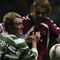 GLASGOW, UNITED KINGDOM - NOVEMBER 04: Aiden McGeady of Celtic tackles Robbie Neilson of Hearts during the Scottish Premier League match between Celtic and Hearts at Celtic Park November 4, 2006 in Glasgow, Scotland  (Photo by Jeff J Mitchell/Getty Images)