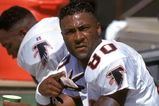 SAN FRANCISCO - SEPTEMBER 19:  Wide receiver Andre Rison #80 of the Atlanta Falcons takes a rest on the bench during a game against the San Francisco 49ers at Candlestick Park on September 19, 1993 in San Francisco, California.  The 49ers won 37-30.  (Photo by George Rose/Getty Images)