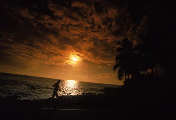 14 Oct 2000:  A silhouette of a runner at sunset during the Ironman Triathlon in Kailua-Kona, Hawaii.Mandatory Credit: Donald Miralle  /Allsport