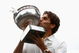 PARIS - JUNE 08:  Roger Federer of Switzerland poses with his French Open winners trophy at the Arc de Triomphe on June 8, 2009 in Paris, France.  (Photo by Ryan Pierse/Getty Images)