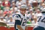 FOXBORO, MA - SEPTEMBER 7:  Quarterback Tom Brady #12 of the New England Patriots passes the ball up the middle during their NFL game against the Kansas City Chiefs on September 7, 2008 at Gillette Stadium in Foxboro, Massachusetts. The Patriots defeated the Chiefs 17-10. (Photo by Elsa Garrison/Getty Images)