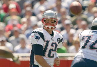 FOXBORO, MA - SEPTEMBER 7:  Quarterback Tom Brady #12 of the New England Patriots passes the ball up the middle during their NFL game against the Kansas City Chiefs on September 7, 2008 at Gillette Stadium in Foxboro, Massachusetts. The Patriots defeated the Chiefs 17-10. (Photo by Elsa Garrison/Getty Images)