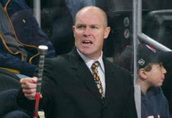 NEWARK, NJ - OCTOBER 04: Assistant Coach John MacLean of the New Jersey Devils gives players instructions in their game against the Philadelphia Flyers on October 4, 2008 at the Prudential Center in Newark, New Jersey. The Devils defeated the Flyers 3-2. (Photo by Bruce Bennett/Getty Images)