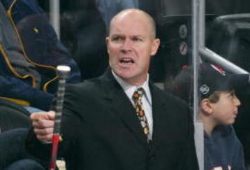 NEWARK, NJ - OCTOBER 04: Assistant Coach John MacLean of the New Jersey Devils gives players instructions in their game against the Philadelphia Flyers on October 4, 2008 at the Prudential Center in Newark, New Jersey. The Devils defeated the Flyers 3-2. (Photo by Bruce Bennett/Getty Images)