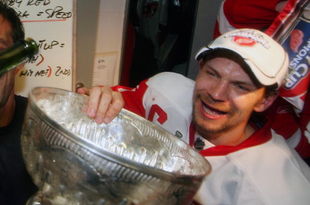 PITTSBURGH - JUNE 04: Nicklas Lidstrom #5 of the Detroit Red Wings celebrates with the Stanley Cup after defeating the Pittsburgh Penguins in game six of the 2008 NHL Stanley Cup Finals at Mellon Arena on June 4, 2008 in Pittsburgh. Pennsylvania. The Red Wings defeated the Penguins 3-2 to win the Stanley Cup Finals 4 games to 2. (Photo by Bruce Bennett/Getty Images)