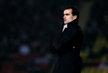 WATFORD, UNITED KINGDOM - FEBRUARY 17:  Swansea Manager Roberto Martinez looks on during the Coca-Cola Championship match between Watford and Swansea City at Vicarage Road on February 17, 2009 in Watford, England.  (Photo by Dean Mouhtaropoulos/Getty Images)