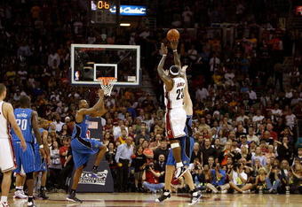 CLEVELAND - MAY 22:  LeBron James #23 of the Cleveland Cavaliers shoots the game winning three pointer over Hedo Turkoglu #15 of the Orlando Magic in Game Two of the Eastern Conference Finals during the 2009 Playoffs at Quicken Loans Arena on May 22, 2009 in Cleveland, Ohio. NOTE TO USER: User expressly acknowledges and agrees that, by downloading and or using this photograph, User is consenting to the terms and conditions of the Getty Images License Agreement  (Photo by Gregory Shamus/Getty Images)