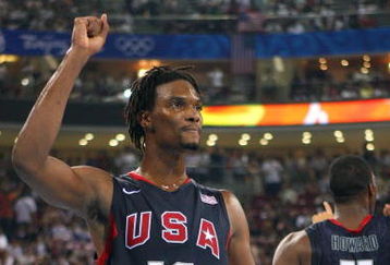 BEIJING - AUGUST 24:  Chris Bosh #12 of the United States celebrates after winning the gold medal game 118-107 over Spain during Day 16 of the Beijing 2008 Olympic Games at the Beijing Olympic Basketball Gymnasium on August 24, 2008 in Beijing, China.  (Photo by Phil Walter/Getty Images)