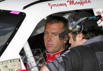 DOVER, DE - MAY 30:  Jeremy Mayfield, driver of the #40 Target Dodge, talks to a crew member in his car during practice for the NASCAR Sprint Cup Series Best Buy 400 at Dover International Speedway on May 30, 2008 in Dover, Delaware.  (Photo by Drew Hallowell/Getty Images for NASCAR)