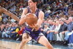 23 Feb 2001:  John Stockton #12 of the Utah Jazz moves with the ball during the game against the Seattle SuperSonics at the Key Arena in Seattle, Washington.  The Jazz defeated SuperSonics 96-84.   NOTE TO USER: It is expressly understood that the only rights Allsport are offering to license in this Photograph are one-time, non-exclusive editorial rights. No advertising or commercial uses of any kind may be made of Allsport photos. User acknowledges that it is aware that Allsport is an editorial sports agency and that NO RELEASES OF ANY TYPE ARE OBTAINED from the subjects contained in the photographs.Mandatory Credit: Otto Greule Jr  /Allsport