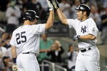 NEW YORK - JUNE 08:  Johnny Damon #18 of the New York Yankees celebrates his solo home run in the sixth inning with teammate Mark Teixeira #25 against the Tampa Bay Rays on June 8, 2009 at Yankee Stadium in the Bronx borough of New York City.  (Photo by Nick Laham/Getty Images)