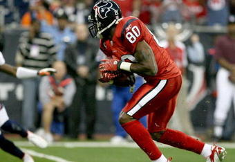 HOUSTON - DECEMBER 13:  Andre Johnson #80 of the Houston Texans runs for yardage during the NFL game against the Denver Broncos at  Reliant Stadium on December 13, 2007 in Houston, Texas. (Photo by Thomas B. Shea/Getty Images)