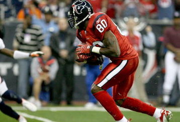 HOUSTON - DECEMBER 13:  Andre Johnson #80 of the Houston Texans runs for yardage during the NFL game against the Denver Broncos at  Reliant Stadium on December 13, 2007 in Houston, Texas. (Photo by Thomas B. Shea/Getty Images)