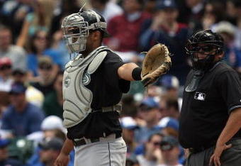 CHICAGO - MAY 2:  Ronny Paulino #29 of the Florida Marlins calls for the intentional walk against the Chicago Cubs as home plate umpire Fieldin Culbreth looks on during the game on May 2, 2009 at Wrigley Field in Chicago, Illinois. (Photo by Jonathan Daniel/Getty Images) 