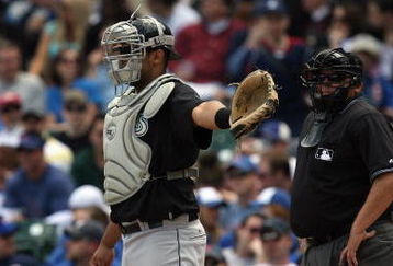 CHICAGO - MAY 2:  Ronny Paulino #29 of the Florida Marlins calls for the intentional walk against the Chicago Cubs as home plate umpire Fieldin Culbreth looks on during the game on May 2, 2009 at Wrigley Field in Chicago, Illinois. (Photo by Jonathan Daniel/Getty Images) 