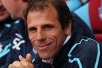 LONDON, ENGLAND - APRIL 25: Manager of West Ham United Gianfranco Zola smiles during the Barclays Premier League match between West Ham United and Chelsea at Upton Park on April 25, 2009 in London, England.  (Photo by Hamish Blair/Getty Images)