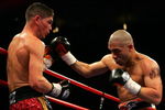 NEW YORK - FEBRUARY 21:  Michael Jennings (L) and Miguel Cotto exchange punches during their WBO World Welterweight title bout at Madison Square Garden on February 21, 2009 in New York City.  (Photo by Chris Trotman/Getty Images)
