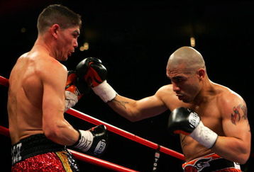 NEW YORK - FEBRUARY 21:  Michael Jennings (L) and Miguel Cotto exchange punches during their WBO World Welterweight title bout at Madison Square Garden on February 21, 2009 in New York City.  (Photo by Chris Trotman/Getty Images)