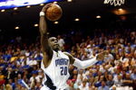 ORLANDO, FL - JUNE 09:  Mickael Pietrus #20 of the Orlando Magic goes up for a dunk in the second quarter of Game Three of the 2009 NBA Finals against the Los Angeles Lakers on June 9, 2009 at Amway Arena in Orlando, Florida.  NOTE TO USER:  User expressly acknowledges and agrees that, by downloading and or using this photograph, User is consenting to the terms and conditions of the Getty Images License Agreement.  (Photo by Chris Graythen/Getty Images)